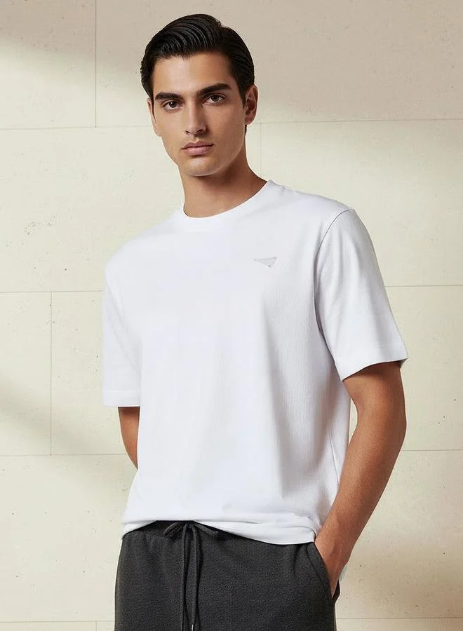 لي كوبر Lee Cooper Men Regular Fit Crew Neck Short Sleeves Badge Detail T-shirt